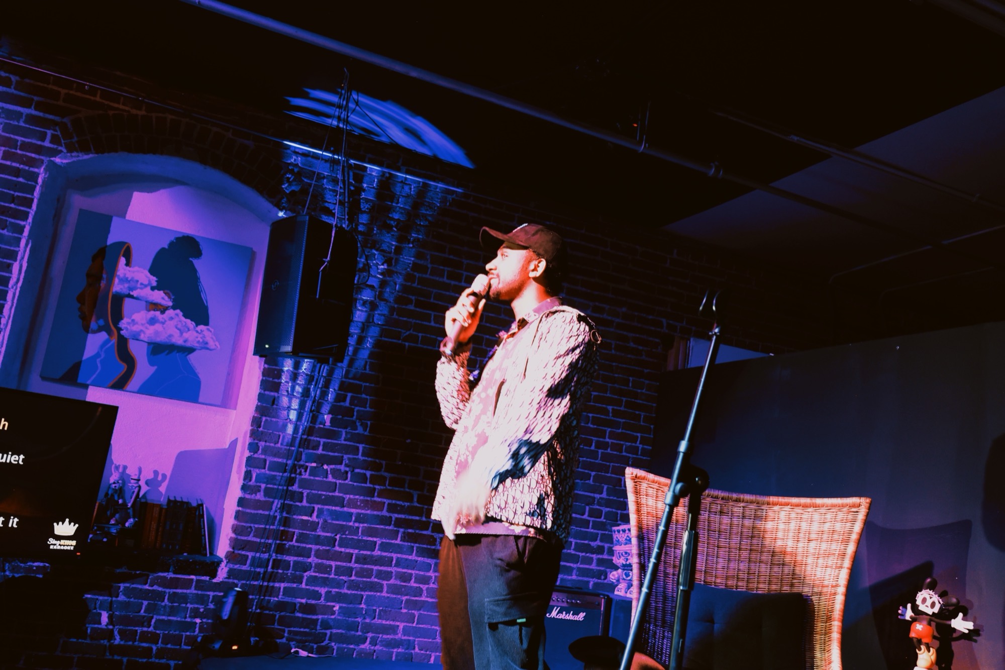 Performer singing on stage